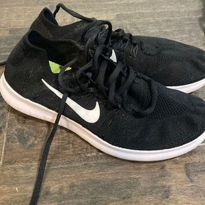 Black and white Nike fly knits